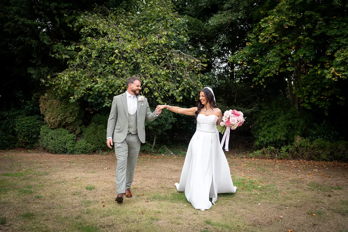 Leila and Mark walking together at Nailcote Hall
