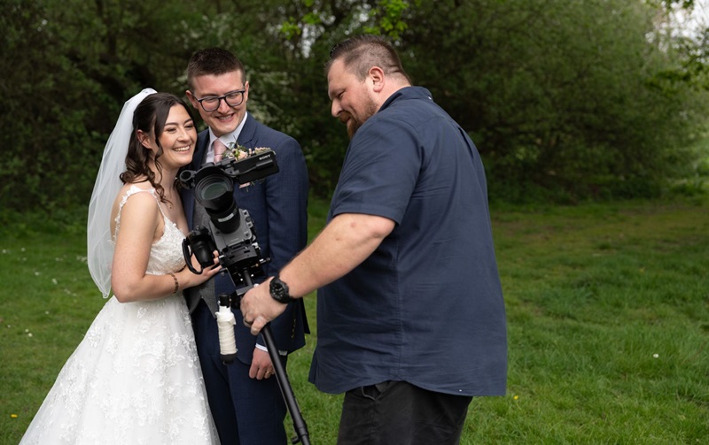 Chris filming a wedding